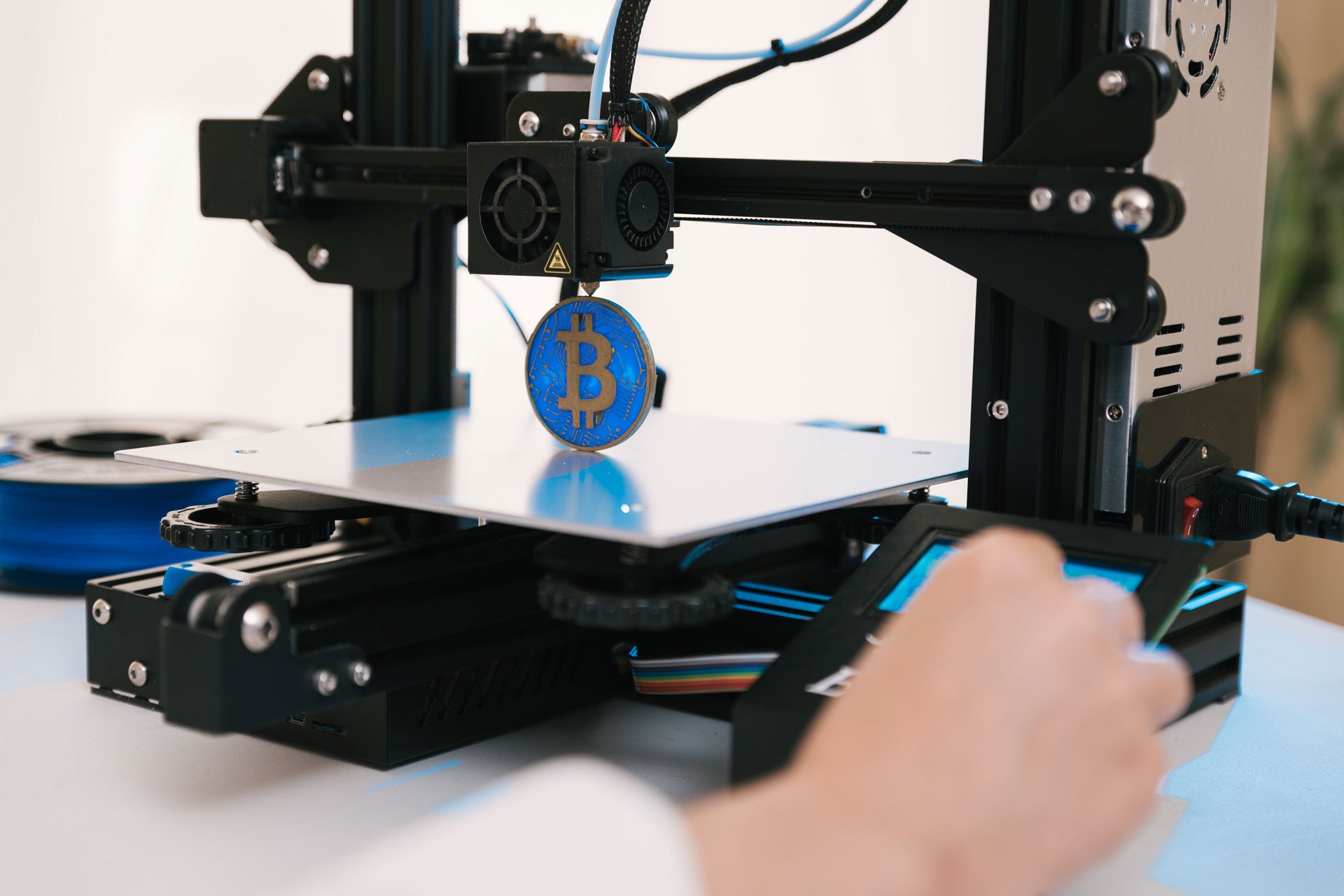 A coin is being printed